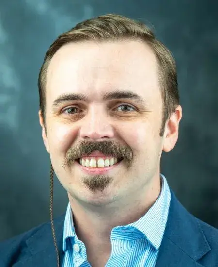 dustin_rumbaugh_headshot.jpg